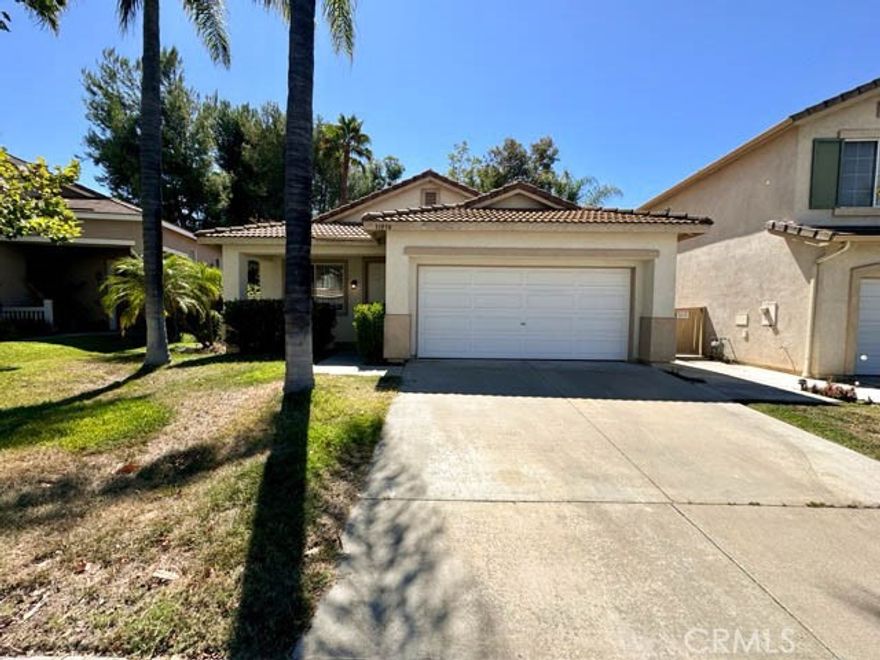This charming single story home in the desirable Paloma Del Sol community in Temecula is available now for LEASE!. With 3 bedrooms and 2 bathrooms, it features a spacious and functional layout that’s ideal for modern living. As you enter inside, you're greeted by vaulted ceilings and a neutral paint scheme that enhances the open and airy feel of the main areas. The upgraded flooring throughout the home adds a touch of elegance, while the open-concept floor plan promotes seamless flow from room to room. The family room is the heart of the home, offering a cozy fireplace and built-in shelving. This space opens up to the dining area and kitchen. The kitchen is beautifully updated with quartz countertops, white shaker-style cabinets, and stainless steel appliances! Down the hall, you’ll find a convenient laundry room equipped with a washer and dryer, direct garage access, and the three bedrooms. The two secondary bedrooms each have been repainted with a neutral paint scheme and offer ceiling fans for added comfort. The primary bedroom is a peaceful retreat with high ceilings, a ceiling fan, and private access to the backyard. The ensuite bathroom offers a shower tub combo, dual sinks, and a walk-in close. Outside, the backyard boasts a covered patio perfect for outdoor dining and relaxation, a yard offering plenty of space for activities, side yards, and the added bonus of no rear neighbors for extra privacy. The backyard will be cleaned up for your enjoyment before moving in. Living in Paloma Del Sol means access to fantastic community amenities, including a pool and spa, playgrounds, BBQ/picnic areas, walking trails, tennis courts, and basketball courts. This home is more than just a place to live; it’s a place to thrive! Dont miss your opportunity, schedule a showing today!