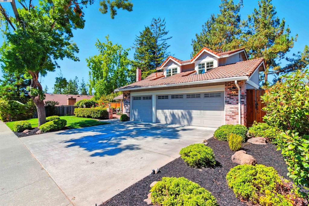 Situated in Walnut Creek’s highly sought-after Rudgear Meadows community, right on the border of Alamo, this beautifully remodeled gem offers the perfect blend of style, comfort, and location. Features 5 spacious bedrooms plus a versatile downstairs bonus room, ideal for a home office or an additional bedroom,2.5 baths, and 2,604 sqft of open-concept living, this home sits on a private lot with a sparkling pool, generous patio space for dining, a grassy play area, and direct access to a hidden park and community greenbelt. Step inside to a freshly painted interior, brand-new carpet, and a bright, airy floor plan. The chef’s kitchen is a true showpiece, boasting granite countertops, stainless steel appliances, a large center island, and newly painted cabinets. Additional features include a whole-house fan for quick, energy-efficient cooling, Nest thermostat, electric safety pool cover, and garage built-in cabinetry with a mudroom/work station. Enjoy your own backyard oasis — perfect for relaxing after work or a day of remote learning — or take advantage of nearby hiking and biking trails. Ideally located just minutes from Round Hill Country Club, top-rated San Ramon Valley schools, parks, restaurants, shopping, and commute routes. This is your lifestyle upgrade !