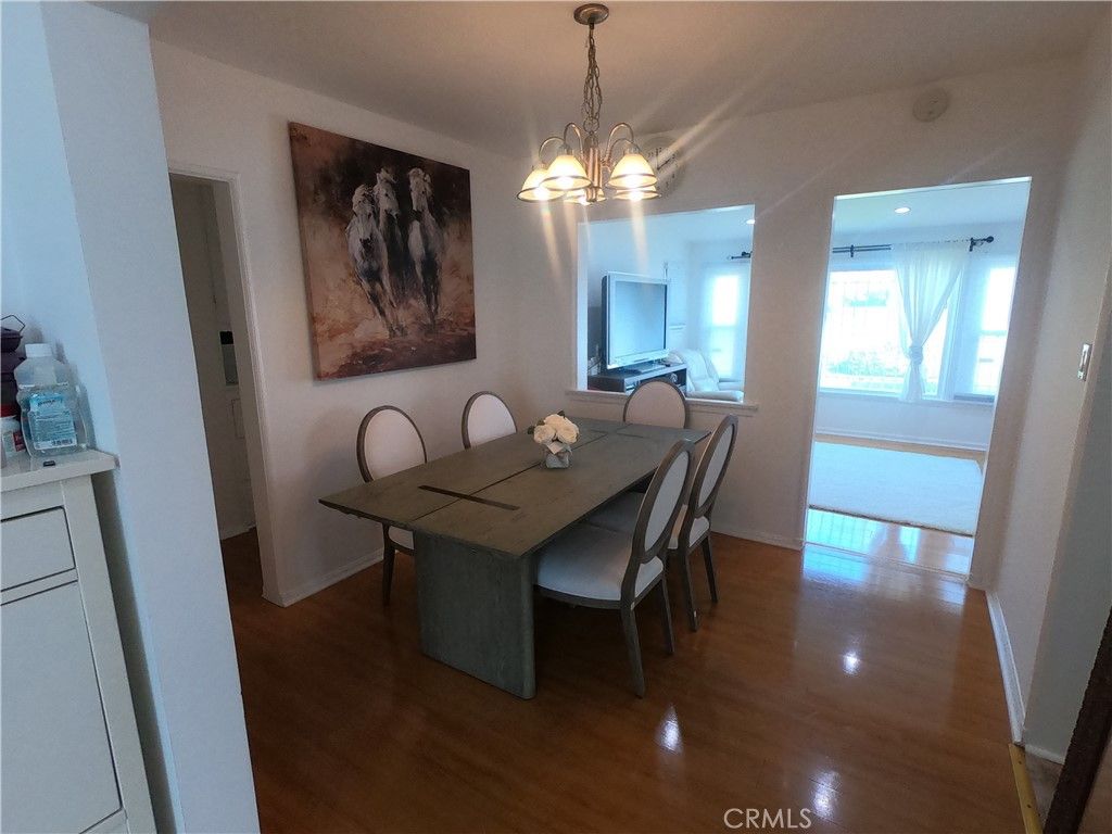 Photo of 9812 S Denker Ave, Los Angeles, CA 90047 (MLS # MB26044758)