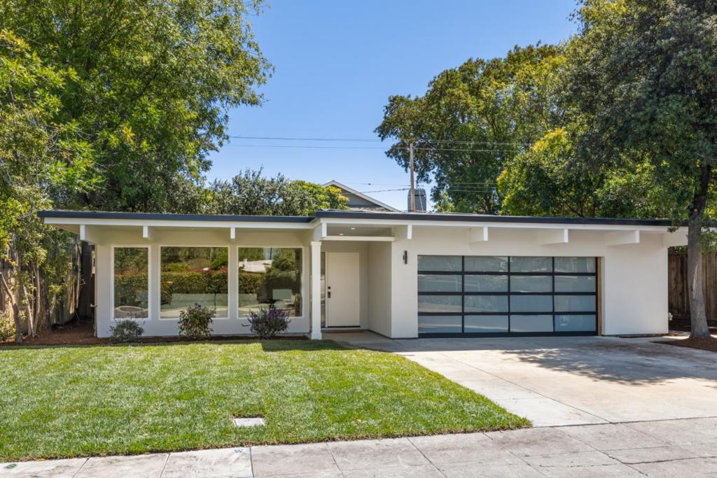Step into this like-new, Eichler-inspired gem in Charleston Gardens, where a top-to-bottom renovation leaves nothing to be desired. Literally rebuilt from the ground up, this home features all new essential systems including drainage and water lines, all new electrical wiring with a 200-amp panel, and double-pane windows alongside new stucco, roof, central heat pump and air-conditioning and landscaping. Inside, you'll find a sleek new kitchen and bathrooms, hardwood floors, and a modern gas fireplace, creating a seamless blend of classic design and modern comfort. Open kitchen/family room, separate living/dining room, large glass windows from every room and separate mud room and laundry. Walk to Mitchell Park and library, Cubberley Community Center, shopping and so much more!