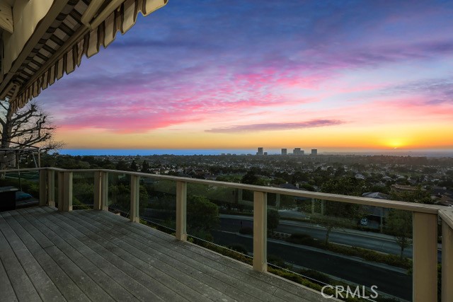 Highly sought-after Harbor Ridge condo with unobstructed, 180° panoramic views stretching from the ocean to the Saddleback Mountains. Rare two-story floor plan with stunning views from both the upper and lower levels. The lower-level primary suite offers convenience and privacy, while two additional en-suite bedrooms provide comfort for family or guests. A powder room completes the layout.
Located on a single-loaded cul-de-sac street in this exclusive gate-guarded community, the home offers exceptional privacy. This is the perfect opportunity to purchase before remodeling begins next month—allowing the buyer to create their dream home with one of the most coveted view locations in Harbor Ridge.