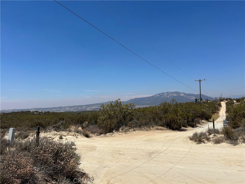 Bring your vision to this AMAZING, gently sloped 23.89 acres with mountain views; approximately .5 mile off of the pavement, approximately 3 miles from Hwy 371, and approximately 23 miles from Temecula. Enjoy the PLENTIFUL fruit trees, vegetables and grow seasons of the area, (USDA Grow Zone 9a), as well as endless opportunities for outdoor activities and star-filled skies. LAND LENDER REFERALS AVAILABLE.