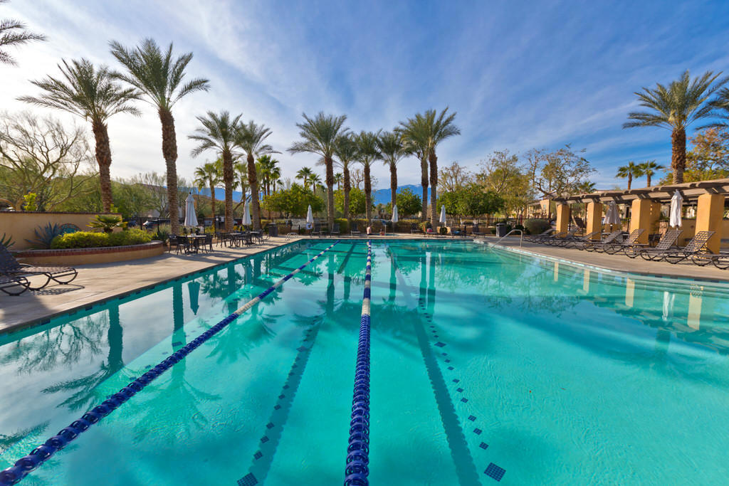 6 or 12 month fully furnished lease. Available July 1, 2025. 2506 sq. ft. four bedroom, three bath Spanish Walk home has been upgraded and is gorgeous. Great outdoor space. Built in 2015, the downstairs is an open-concept plan including a gourmet kitchen, formal dining area and family room with a fireplace and private bedroom and bath. Upstairs includes Master bedroom and bath on one side of the home, laundry room, large entertainment room/loft separates the Master from other two bedrooms and bath. Three-car tandem garage with epoxy flooring. Three pools, spa, playground, large grassy area for soccer, football, or just running in the grass, a picnic area, Clubhouse with kitchen and eating area for larger groups, meeting room, billiard room, fitness room. Great location with easy access to shopping, dining and the freeway. Not a 55+ community.