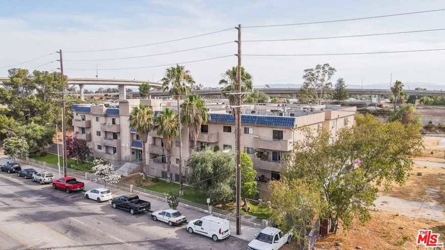 Long-term tenant. Long-term value.Top-floor 3 BD / 2 BA condo in a desirable gated building with elevator, pool, and community laundry. Light-filled 1,182 sq ft layout with private balcony and west-facing sunset views. Excellent tenant in place since 2018 paying $3,664/mo on time. Quiet, well-maintained community near the 118 Freeway, schools, parks, and shopping.