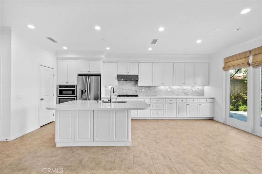 Photo of 99 Lupari, Irvine, CA 92618 (MLS # OC26104946)