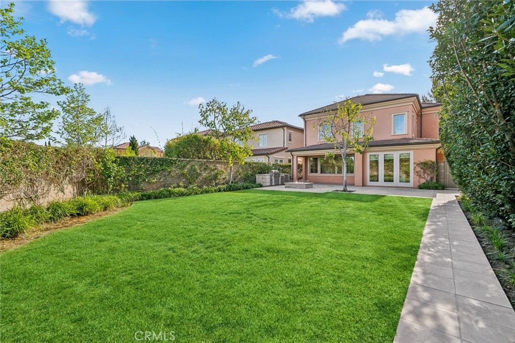 Photo of 99 Lupari, Irvine, CA 92618 (MLS # OC26104946)