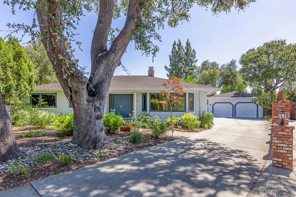 Remodeled with designer style, this spacious home offers bright and open living spaces that seamlessly flow from one to the next, a sleek chefs kitchen, a secluded bedroom wing, and a large lot of approximately 13,200 square feet. Throughout the home youll find gorgeous light-hued hardwood floors, modern upgrades, and expansive windows filling each room with abundant natural light. The living room overlooks the front yard via a wide bay window and shares a to-the-ceiling brick fireplace with the comfortable family room. The dining room enjoys another wide bay window, direct access to the kitchen, and a striking LED chandelier. The primary suite sits privately at the back of the home with access to the yard and a spacious spa-like bath. Experience fabulous indoor/outdoor living with a large flagstone entertaining patio, level lawn for play, and mature trees and plantings lining the perimeter of the yard providing welcomed shade and privacy. Sought-after location at the end of a quiet cul-de-sac just minutes from commute routes, local parks including sprawling Cuesta Park, Grant Park Plaza shopping center, tech employers, and top-rated Los Altos schools.