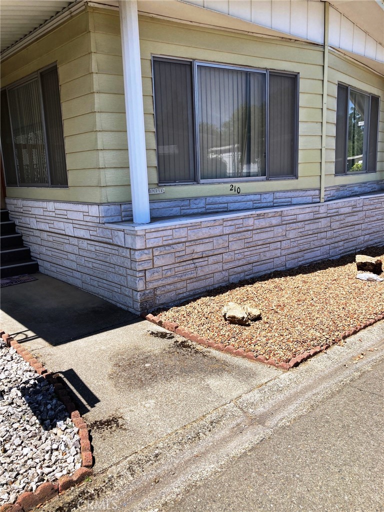 Charming 2-Bedroom Home in Desirable Casa de Flores Community!
Nestled on sought-after Lily Drive in the popular Casa de Flores Mobile Home Park, this spacious 2-bedroom, 2-bath home offers comfortable living in a vibrant 55+ community. Inside, you’ll find separate living and family rooms filled with natural light, thanks to a wall of windows in the living area. The open-concept kitchen features ample counter space and abundant cabinetry—ideal for cooking and entertaining.
The family room includes a sliding glass door that leads to a generous deck, perfect for relaxing or hosting guests. The primary suite boasts a large bathroom with both a soaking tub and a separate stall shower.
Enjoy year-round comfort with central heating and air conditioning. Outside, the home offers a fenced yard, a covered carport with space for two vehicles, and low-maintenance landscaping.
Casa de Flores is a well-maintained, quiet community with resort-style amenities, including a beautiful clubhouse, swimming pool, and a full calendar of activities for active seniors. Conveniently located near shopping, dining, theaters, and professional services—this home offers the best of comfort and convenience
