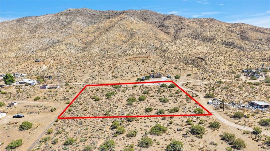 Just over 2 acres is this amazing CORNER LOT waiting for you to build your own home! In the county area of Apple Valley- which allows for livestock, equine, homesteading, etc. You could even add an ADU here. Appreciate the rural feel of desert living while being a short distance to major shopping and dining as well as the freeway, Silverwood Lake and mountain communities. Power poles run along Canaille Rd for close connection. Leave from horse back, or your desert toys to appreciate all that the desert has to offer