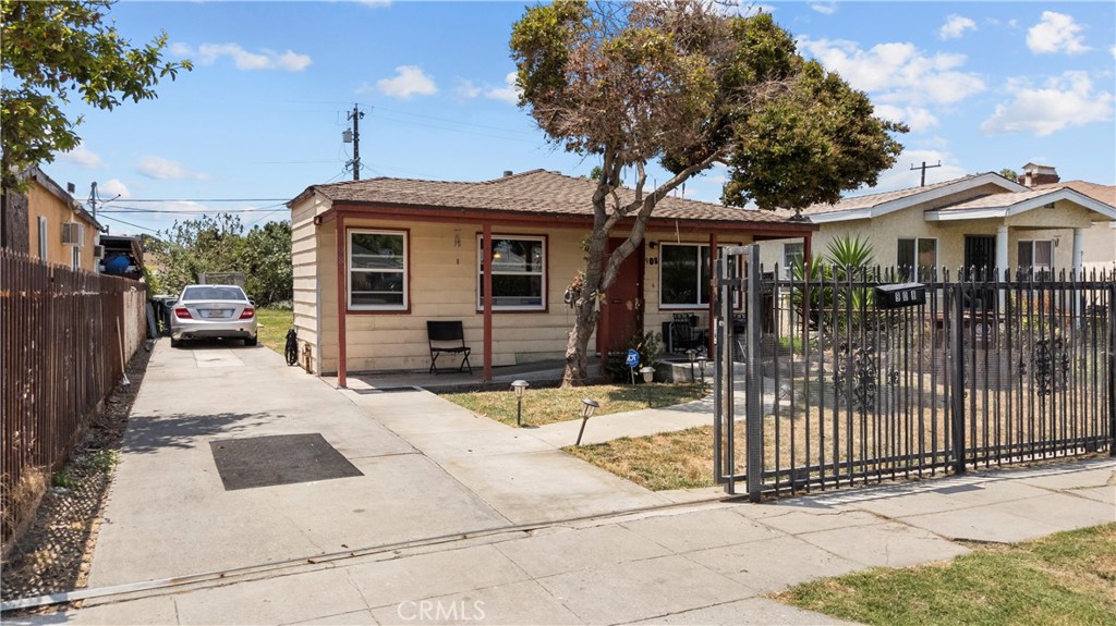 Step into charm, comfort, and possibility in the heart of Compton. This well-kept 2-bedroom, 1-bathroom single-family home offers inviting curb appeal, a functional layout, and a deep 5,680 sq ft lot — ideal for relaxing, entertaining, or expanding as your needs grow. With 808 sq ft of cozy living space, the home features natural light, a warm interior flow, and a long driveway for ample off-street parking. The spacious backyard is private and peaceful, with potential for future enhancements like an ADU or garden retreat (buyer to conduct their own due diligence with the City of Compton to verify feasibility). Whether you're a first-time homeowner seeking a place to settle in or a savvy buyer looking for flexibility and long-term upside, this home delivers the perfect blend of comfort, character, and value. Property is offered in current condition with no seller repairs or credits. Priced accordingly. Buyer to assume all City pre-sale compliance tasks after close. No garage currently exists. Shown by appointment only — do not approach or disturb the occupant under any circumstances. Contact listing agent for access.