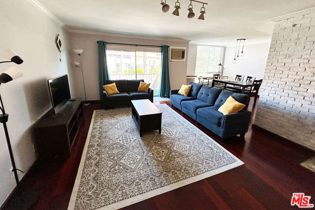Available 10/10/25. Newly remodeled FURNISHED 1bd/1bth condo in a quiet neighborhood just steps from San Vicente. Bright and spacious front-facing 2nd-floor CORNER unit with a large living room and a sunlit balcony. Tons of natural lighting! IN-UNIT laundry, separate dining room or office, and a mini bar with built in sink & cabinets! Kitchen includes new appliances (washer/dryer combo, range/oven, dishwasher, microwave, and refrigerator). Primary suite offers an extra large closet with mirror doors. Tons of storage with built-in wall cabinets and a coat closet. Most furniture shown in photos can be provided upon request. Includes: Floor heating, A/C wall unit, one covered parking space, and in-unit laundry. Will consider pets. No smoking policy. Utilities: water & trash included, Tenant pays electricity. Near Whole Foods, UCLA, Westwood Village, Brentwood Country Club, Stoner Park, easy access to Wilshire and the 405.