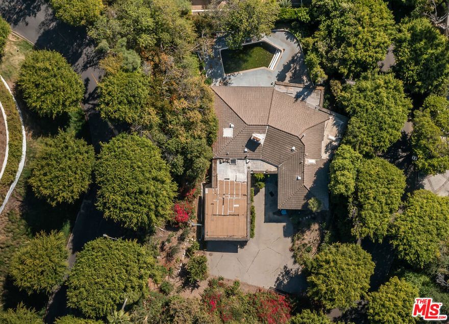 Exceptional opportunity to build a brand-new estate in one of the most coveted pockets of Beverly Hills. Located on prestigious Laurel Way, this rare offering presents the chance to create a custom residence surrounded by world-class homes and panoramic canyon and city views. Set on an expansive lot in the heart of the 90210, the existing structure is ready for redevelopment  the true value lies in the land and the limitless potential it offers. Whether you're a developer or end-user, this is a blank canvas ready for your vision.