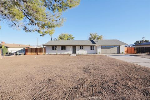 Photo of 11385 Chimayo Road, Apple Valley, CA 92308 (MLS # HD25275089)