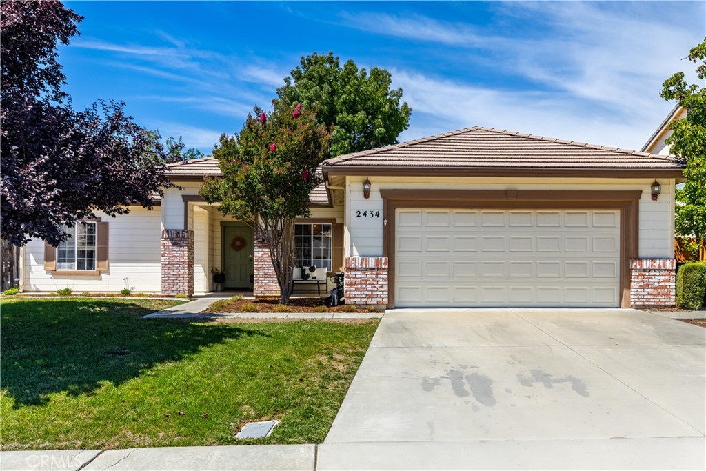 Welcome to this beautifully maintained & updated single-story home offering just under 1,500 square feet of comfortable and stylish living space. This 3-bedroom, 2-bath home combines warmth and functionality with an open layout filled with natural light. Step inside to find newer luxury vinyl plank flooring throughout much of the home, and into a spacious front room that can perhaps serve as a formal living or dining room. The open-concept kitchen and family room create the perfect gathering space, featuring painted cabinetry, sleek stainless steel appliances, a breakfast bar, and a charming breakfast nook. A pantry with a sliding barn door adds both character and convenience. The two guest bedrooms and full bath are finished with modern concrete floors for a contemporary touch. The private primary suite includes a walk-in closet and a sliding glass door that opens directly to the backyard patio. The en suite bath features a dual vanity with updated fixtures and a walk-in shower. Outdoors, enjoy a fenced patio and backyard with a shaded patio area - ideal for relaxing, entertaining, gardening, or play. A detached shed provides extra storage space, and the finished garage features epoxy floors and storage cabinets for organization and durability. The home also includes leased solar with a Shift non-backup battery, providing energy efficiency. Additional highlights include an individual laundry room and a fantastic location near award-winning wineries, schools, and shopping. This is Central Coast living at its finest - don’t miss your chance to call it home.