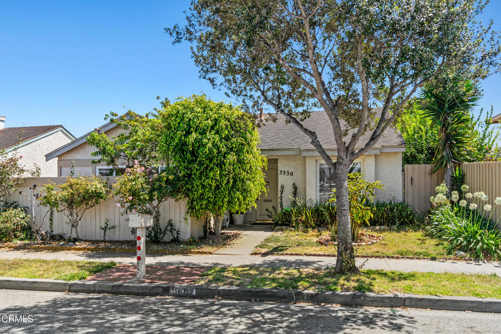 Opportunity knocks! Welcome to 3330 Ketch Avenue, perfectly situated in the desirable Channel Islands Harbor area, where coastal living meets opportunity. Just a short stroll or bike ride to the harbor, local dining, and the sandy shores of Oxnard's beautiful beaches. This single-story 4- bedroom, 2-bathroom home offers the perfect foundation to create your dream coastal retreat. Step inside to find a spacious open floor plan with wood-look flooring, a cozy fireplace, and abundant natural light. The kitchen features granite countertops, stainless steel refrigerator and dishwasher, and views into the dining and living areas--perfect for entertaining. A bonus wet bar area provides extra functionality for gatherings. The primary bedroom includes a walk-in closet and an updated vanity with a glass vessel sink, offering a touch of character. Sliding glass doors in the living area open to the backyard, ready for your personal touch--whether you envision a garden, outdoor dining space, or a relaxing coastal escape. While this home needs some TLC, its unbeatable location and solid floor plan make it a rare find in this sought-after neighborhood. With a little vision and care, 3330 Ketch Avenue could be transformed into the perfect harbor-close home or investment property.