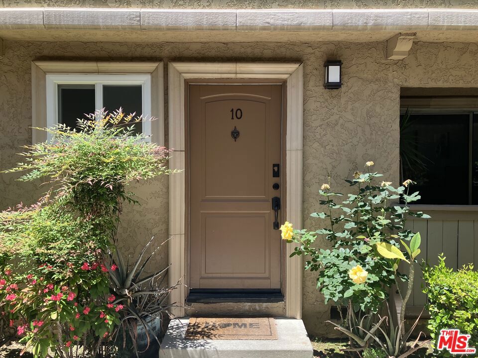 Welcome to this recently remodeled stylish 3-bedroom, 1.5-bathroom townhome offering 1,340 sq.ft. of spacious living area in a centrally located in a cul-de-sac of Winnetka neighborhood. This unit features a modern interior with fresh/newer paints in many areas, recently updated floorings, vanities, and double-pane-windows. Recently got their air ducts cleaned professionally. On the first floor, the open-concept layout seamlessly connects the living areas, front patio, dining area, and the kitchen. Primary bedroom upstairs is spacious and bright, with fully extended closet. two additional bedrooms are also spacious. One full bathroom upstairs, one half bath downstairs. Additional highlights included an in-unit utility room with washer & dryer hookups, which leads to a private open patio for BBQs, or a play area. This building is located on the South side of Cohasset, which has 24-hour gated entrance to the parking area. 2 side-by-side assigned carports. Community amenities include: pools and spas, fitness room, mini park & playground, clubhouse with full kitchen, and laundry area (although you can have your own washer & dryer in unit) HOA ($449/month) covers water, hot water, trash, exterior and common area maintenance, and owner's insurance policy. Close to town's well-known shops, restaurants, grocery markets, schools, transportation, 101 FWY, and Runnymede park!