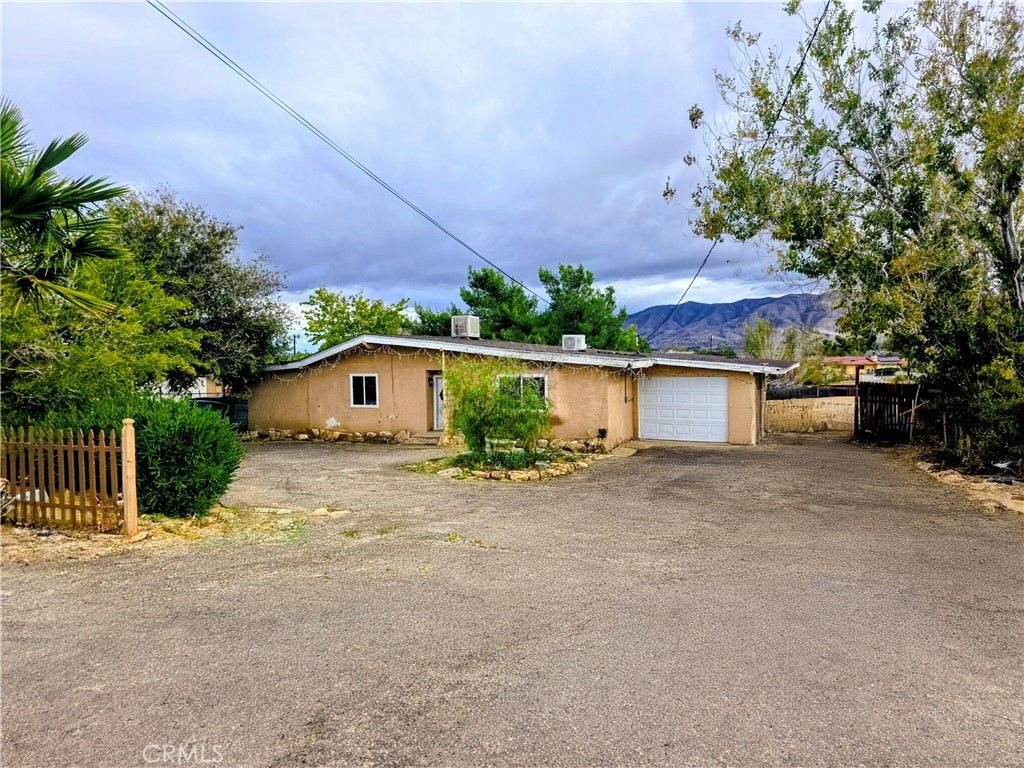 Photo of 9321 Sabina Avenue, Hesperia, CA 92345 (MLS # IV25265217)