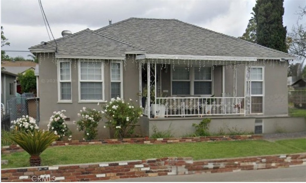 Do Not Disturb Occupants! Fantastic investment opportunity in East Los Angeles! This unique property offers two homes on one lot. The front home features 2 bedrooms, 1 bathroom, approximately 1,189 sq ft, with tile flooring throughout, an open floor plan, and a spacious kitchen perfect for gatherings. The rear bonus ADU includes 1 bedroom, 1 bathroom, plus an extra room that could serve as an additional bedroom, home office, or den. A long driveway provides ample parking, and a low-maintenance cement backyard sits between both units. Well-maintained and tenant-occupied, this property is ideal for investors seeking rental income or multi-generational living. Conveniently located near shopping, dining, and freeway access.