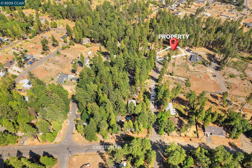 Build your dream home on this 0.32-acre lot in the heart of Magalia. Located in the Paradise Pines Property Association (PPOA), recently cleared and ready for your vision, this property backs to a peaceful greenbelt and is surrounded by mature trees. Enjoy community amenities like a pool, BBQ area, clubhouse, bocce ball courts, horseshoe pits, a game room and fun, year-round events. With a mix of pre-existing charming homes and new construction nearby, this is a great opportunity to be part of a welcoming neighborhood!