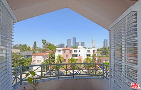 Photo of 2015 S Beverly Glen Boulevard #402, Los Angeles, CA 90025 (MLS # 26861543)