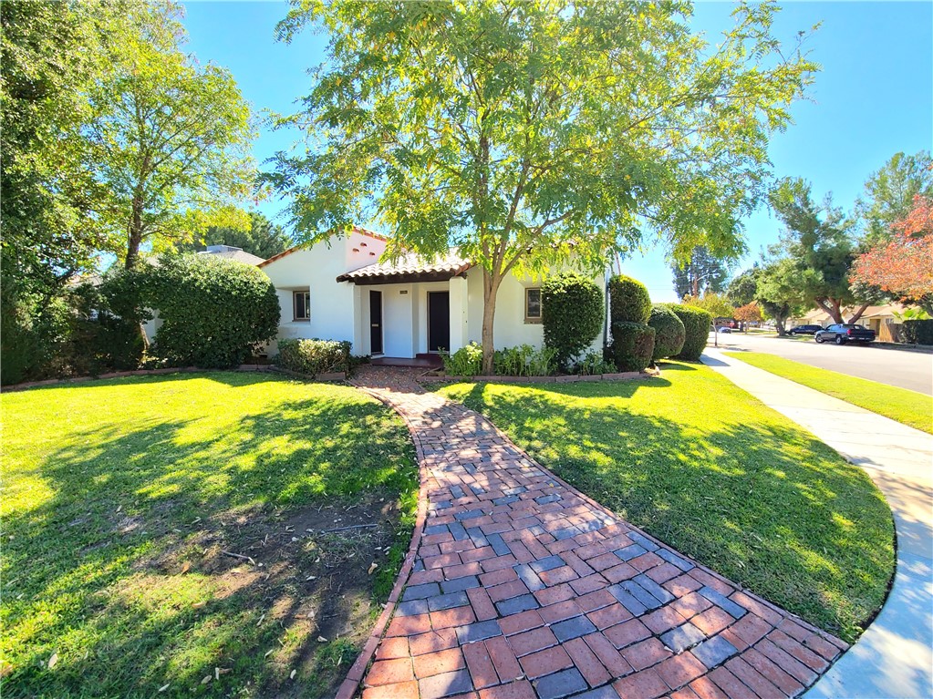 Single-Story 3-Bedroom Redlands Home! Historic Spanish Casa on a Corner Lot. Living room with Fireplace, and Mini-Split Heating/Cooling Units in all rooms. Stove (gas), New Refrigerator, and Washer/Dryer Hookups in the 1-Car Attached Garage. Charming Fenced-In Patio. U of R within Walking Distance! Gardening Included! No Pets Please.