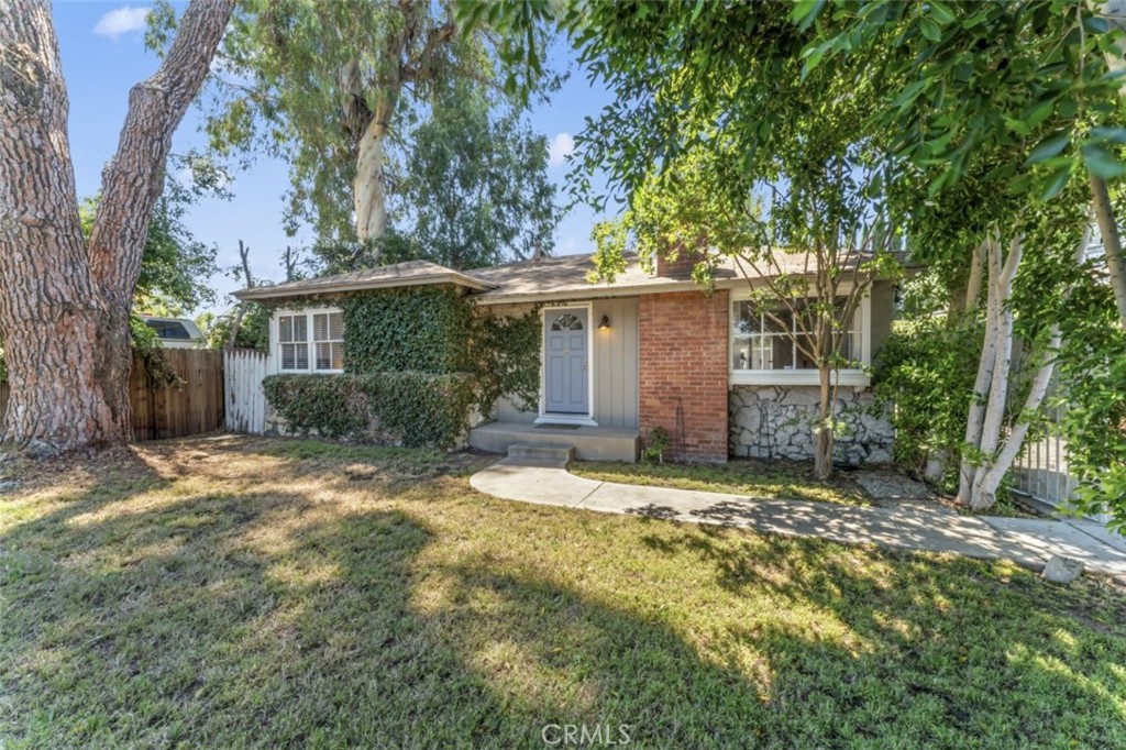 This Woodland Hills 3 Bedroom/1 Bath Home is NOW ready for a new owner!
This is a Perfect chance to Buy a Great Starter Single Family Home with plenty of Room to Expand and Grow.
Features Include: Hardwood Floors, Fireplace, Bay Window in Living Room, Ceiling Fans, Stainless and Steel Appliances all giving this home BOTH Charm and Character. With a large Backyard, there is NO reason to Rent anymore OR buy a condo. So Look No Further.
ALSO, this Property has the Perfect Arrangement for an ADU. The Garage is Detached and sits in the Backyard Behind a Long Gated Driveway. PLUS-- there is approximately a 180 sq ft addition on the side of the Garage making for an Extra Large Interior area. The back wall already has a Sliding Glass Door Opening into the Backyard. So with just under 600 sq ft it is set up as the PERFECT ADU Conversion or a Separate Office.
With the Large Backyard there are many Possibilities for this property. Do Not Delay, Call TODAY to make Your Appointment to view this Home.