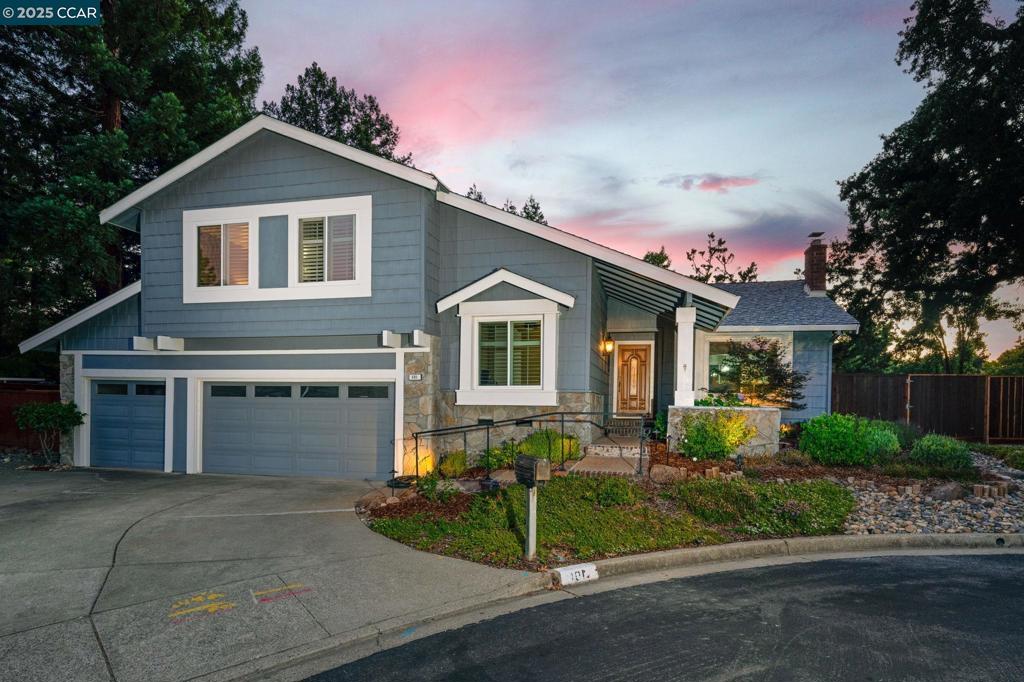 Tucked away at the end of a quiet court, 101 Stowbridge is a hidden gem that perfectly blends privacy, charm, and convenience. This traditional 4-bedroom, 3-bathroom home offers appx 2,344 sqft of well-designed living space in a peaceful setting next to open space—with stunning views of Las Trampas Ridge and beautiful sunsets to enjoy. Inside, the thoughtfully remodeled kitchen features quality finishes and opens seamlessly to the dining and living areas, creating a functional flow ideal for both daily living and entertaining. Rich hardwood floors run throughout much of the home, adding warmth and timeless style. A full bedroom & bathroom on the main level offer flexibility for guests, a home office or multigenerational living. Upstairs, the spacious primary suite offers vaulted ceilings, a walk-in closet, and a generous ensuite bath complete with a sunken tub, double vanities, and a private water closet. Dual-pane windows throughout allow abundant natural light to fill the space. The expansive side yard presents endless possibilities—ideal for a basketball court, utility area, or the pool you’ve always envisioned. Its peaceful court location offers privacy and low traffic, all while being just minutes from downtown Danville, top-rated schools, and convenient freeway access.