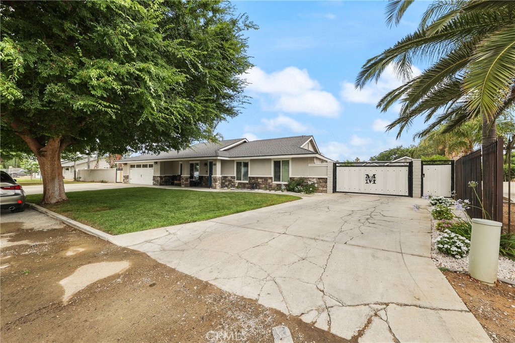Unique Multi-Unit Property with Pool, Oversized Shop, and Income Potential! Welcome to 8963 Bold Ruler Lane in Jurupa Valley — a one-of-a-kind property offering exceptional space, flexibility, and rental income opportunities! The main home, originally built in 1975, features 5 bedrooms and 2 bathrooms, with tasteful upgrades including crown molding and plantation shutters in the living room and bedrooms. The current owner, a licensed contractor who purchased the home in 2004, converted the garage into 2 additional bedrooms and a laundry room, with plans available to transform the space into a Jr. ADU. Step outside to your private backyard retreat complete with a sparkling pool, a covered patio with built-in BBQ and oven, and plenty of space to entertain family and friends year-round. At the rear of the property sits a massive oversized shop/garage totaling approx. 1,600 sq ft, with soaring 14-ft ceilings, two 12x12 automatic garage doors, a ¼ bath, Office space, and 400 sq ft of additional second-story storage. Whether you’re a contractor, car collector, small-business owner, or need serious workspace, this structure delivers. Above the shop are two additional units: • Unit 1: 2 beds, 1 bath, approx. 1,000 sq ft, walk-in pantry, and in-unit laundry • Unit 2: 1 bed, 1 bath, approx. 600 sq ft with its own laundry area Toward the back of the lot, you’ll also find: • Unit 3: Detached 2 bed, 1 bath, approx. 867 sq ft with laundry area • RV parking area with full hookups — ideal for guests or added convenience This property is perfect for large or multigenerational families looking for extra space, privacy, and room to grow — or for anyone interested in creating multiple income streams. With its flexible layout, extensive upgrades, and impressive shop space, this Jurupa Valley gem is truly a rare opportunity!