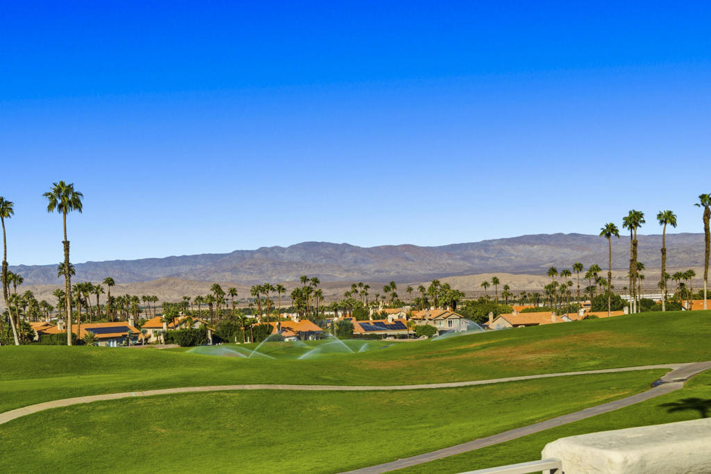 TOTAL UPSCALE REMODEL -GOLF COURSE & MOUNTAINS VIEW PROPERTY-3 FULL BEDROOMS- 2 FULL BATHROOMS AND ONE-HALF BATH! Located in the Heart of Palm Desert in Beautiful Desert Falls CC. Offered turnkey Furnished!Naturally Bright- tiled throughout except for bedrooms.  Kitchen is a chef's delight with gas stove, double door stainless steel refrigerator.  Granite slab counters.  Pull outs in pantry.  Open to dining room -granite counters wide for prepping meals and room for bar stools. Overlooking dining room with additional large window. There's also a cheery light filled breakfast nook -See beverage fridge. All great appliances. Open floor plan.  Shutters on all windows.  Primary bedroom is a delight overlooking the golf course. Large Walkin closet.   Primary bathroom is a wow, Upscale remodel as are all the bathrooms.  Guest suite is located on opposite side of property with its own Walkin closet and stunning bathroom.  Third bedroom or den -can be used as a bedroom or an office.   Entrance has a large patio facing south.  Back patio faces the extensive double fairways golf course views! Mountain views to the west and to the north.  One of the many pools located directly across the street (has its own bathrooms:) HOA monthly dues offer great amenities - membership to the Health & Fitness Ctr, great tennis and famous pickle ball!  Wi-fi, cable, all exterior & roof, all pools, ALL HEATED TOO!  24 hr. guard gated roving security, all the grounds. The semiprivate golf course is noted as a Championship resort course, open for memberships or pay as you play and dine!  Short term rentals allowed.  Close to all kinds of shopping, restaurants galore, plenty within walking distance!  Across from the JW Marriott Desert Springs.  Close to the Palm Springs A/P, famous Acrisure Arena, new CV Link for biking, walking only! Theaters, much hiking, city run Desert Willow golf courses & stunning clubhouse, minutes from Eisenhower medical, and right off the I-10.  Call for your private tour!  You won't be disappointed!