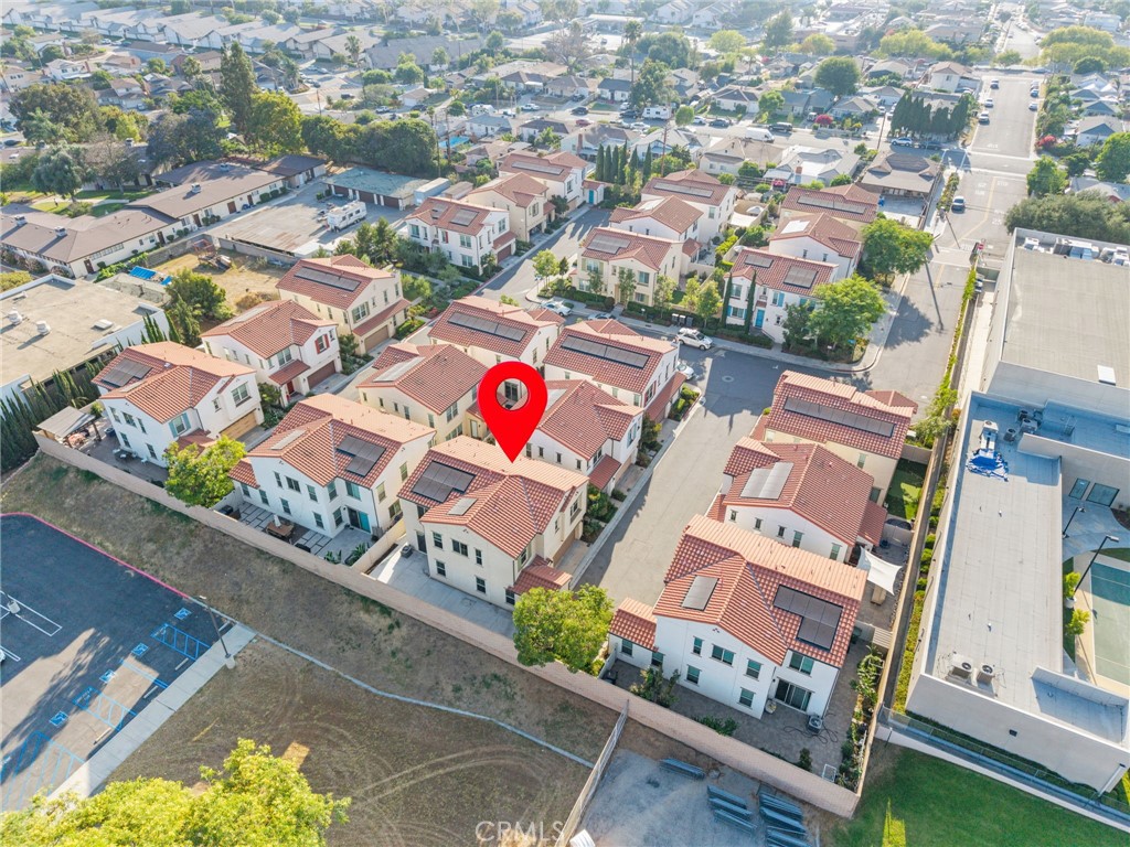 GATED community, LOW HOA, END UNIT, with school VIEW. Welcome to this charming detached condo located in a quiet and highly sought-after gated community in Rosemead. This well-maintained home features 4 spacious bedrooms and 3 full bathrooms, including one bedroom and one full bath conveniently located on the first floor—perfect for multi-generational living or hosting guests. The open-concept living room flows naturally into the kitchen, which is equipped with modern appliances and ample cabinet space. The low-maintenance backyard features a fully paved concrete surface, ideal for easy upkeep. Additional highlights include central A/C and a prime location near schools, parks, shopping centers, and with quick access to major freeways. A must-see for buyers seeking both comfort and convenience in the heart of the San Gabriel Valley!
