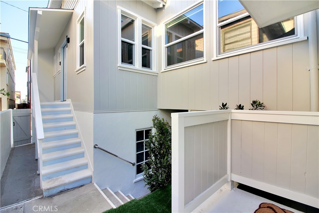 Remodeled 1 bedroom apartment atop a two car garage in an absolutely superlative location 2 blocks to the Beach in North Hermosa Beach. This wonderful open layout includes a spacious living area with a dining bar adjoining the kitchen. The kitchen has quartz countertops and ample cabinetry with new stainless steel appliances, plus private stackable laundry. The bedroom is very spacious as well. The well appointed bath has beautiful fresh tile. Includes high efficiency heat and AC mini-split system and 1 dedicated parking spot inside 2 car garage.
