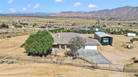 Photo of 26030 Roundup Way, Apple Valley, CA 92308 (MLS # HD26228144)