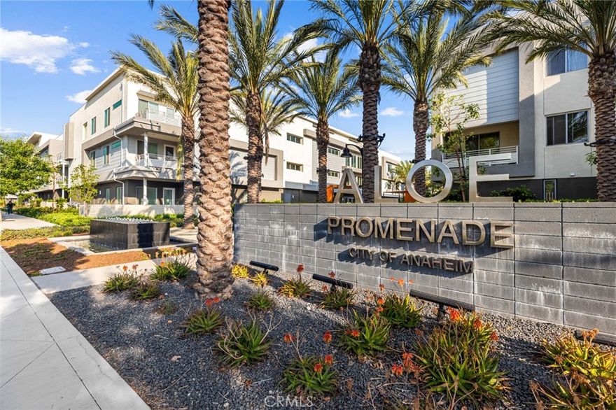 Experience upscale, low-maintenance living in the heart of Anaheim at Alia A-Town—this like-new 2021-built ground-level condo is move-in ready and full of modern charm. This spacious 1-bedroom, 1.5-bath end-unit shares only one wall, offering added privacy and comfort. The open-concept layout features a light-filled living and dining space that flows into a chef’s kitchen, complete with stainless steel appliances, ample cabinetry, generous counter space, a breakfast nook, and a large center island perfect for cooking and entertaining. The primary suite is an elegant retreat with a spacious bedroom, walk-in closet with built-ins, full-length mirrored doors, and a luxurious en-suite bathroom featuring an oversized tiled walk-in shower and dual vanities. Enjoy indoor-outdoor living with a huge covered patio ideal for relaxing or hosting friends. Additional highlights include room for 1 car in garage, stylish architectural finishes, and quality materials throughout. Community amenities feel like a resort, with access to a sparkling pool, spa, BBQ area, park-like green spaces, and a tot lot for families. Located in one of Anaheim’s most dynamic neighborhoods, this home offers the perfect balance of urban and suburban convenience—close to walking trails, Angel Stadium, the ARTIC Train Station, Disneyland, Knott’s Berry Farm, Chapman University, and the Outlets at Orange. You'll also enjoy nearby dining, top-rated hospitals, and easy access to the 5, 57, and 22 freeways, making this an ideal spot for commuters or anyone who loves the energy of Orange County. Don't miss this turnkey unit that is ready for you to make your own! The Garage is #48.