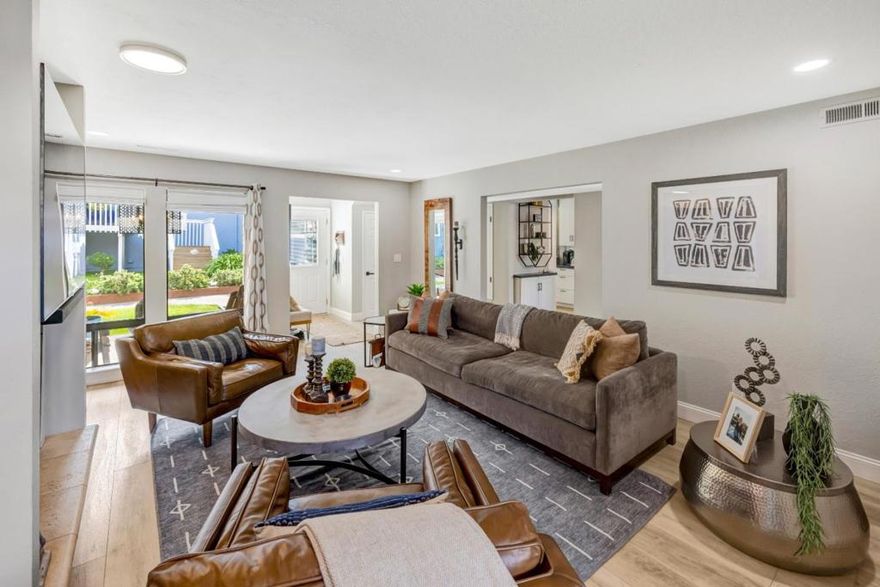 Welcome to this beautifully updated 3-bedroom, 1.5-bathroom townhouse offering 1,587 sq ft of comfortable coastal living. Ideally located just minutes from the ocean, this rare end-unit provides exceptional privacy with no shared walls and a thoughtfully designed layout. Step inside to discover a stylish interior featuring modern flooring, a renovated kitchen, and updated bathrooms. The spacious living area includes a cozy wood-burning fireplace, perfect for cool coastal evenings. Enjoy your own private front yard, great for outdoor relaxing or entertaining, along with front and rear patios letting in lots of light. With close proximity to beaches, parks, shopping, and dining, and an easy commute to surrounding areas, this turnkey townhouse is the perfect blend of convenience, comfort, and coastal charm. Don't miss your chance to own this special home in the heart of Aptos!