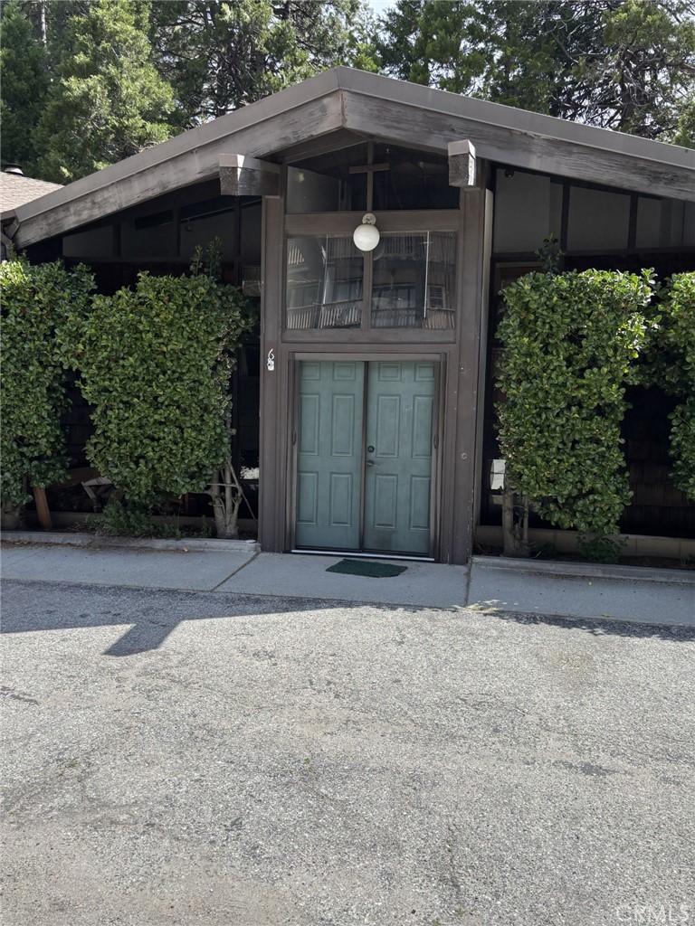 More for your money per square foot SELLER WILL CREDIT AT COE $3000 to BUER FOR INTEREST RATE BUY DOWN. Look here for full time living or as a second home . Minutes from Lake Arrowhead Village and Lake (aprox 8 Min), close to Snow Valley ski area for winter enjoyment or Lake Gregory reginal Park close by. Park at your front door . This split level design has loads of character, only 6 steps between floors, Upper level has a Huge wood burning fireplace placed right between the Living room and Dining room that level includes the kitchen a full bathroom and bedroom. High ceilings and large windows allow for tree views and natural light thru this area. The kitchen is updated with granite counters and stainless steel appliances. There are 2 outdoor decks upper and lower area lower deck has a gate to back of property for walking a dog or access to tennis court and basketball hoop.. There is a well built storage shed on lower deck accessible from both sides. The Lower level has 3 more bedrooms master with 3/4 bath. full bathroom and laundry on that level. The community offers tennis and private swimming pool for residents. HOA covers outdoor maintenance, roof, and exterior maintenance, pool, tennis courts, trash service, and snow removal. This four season mountain resort area is located minutes to Blue Jay and Lake Arrowhead Village, Lake Gregory is a regional Park minutes away offering swimming, water slide, and floating fun, there is Kayaking, Paddle Boarding, fishing and more.