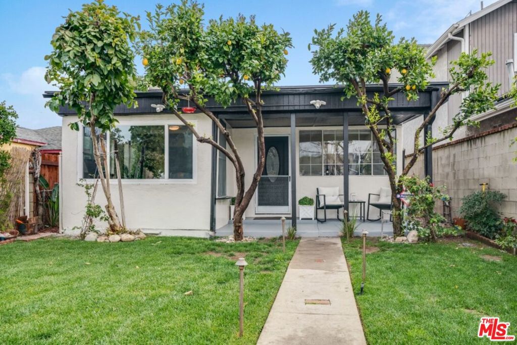 Chic Sherman Oaks Charmer! Gated, secure, and full of character this 2 bed/3 bath cottage sits in the heart of Sherman Oaks. Step through the spacious front yard and into a sun-drenched, single-level storybook home with soaring ceilings and an airy, open layout. The oversized living room features a sleek, heat-generating fireplace, perfect for cozy nights or cool vibes.The gourmet eat-in kitchen shines with newer stainless steel appliances, granite countertops, and a seamless flow into the dining area and bonus room ideal for a home office, gym, or playroom. Both bedrooms are en-suite, plus there's an extra full bath for guests.Step outside to your private entertainer's paradise brand new pergola, built-in firepit, and room to relax. Detached one-car garage with ADU potential, plus recent upgrades to bathrooms, roof, floors, electrical, and brand-new washer/dryer. Tons of street parking! A perfect condo alternative or first home don't miss this gem!