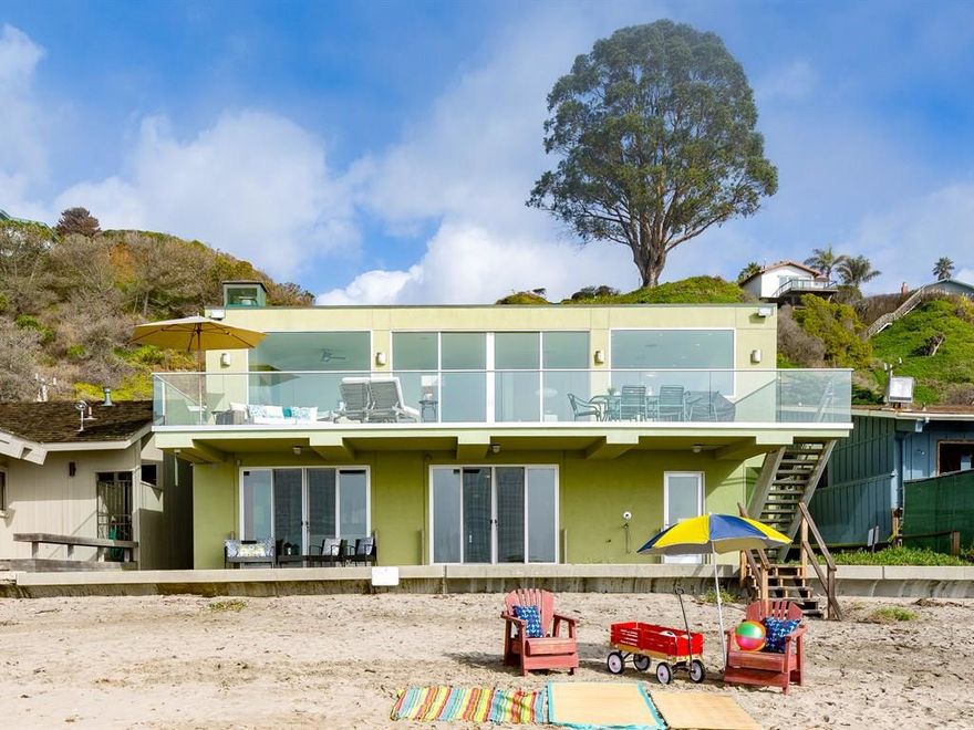 Magnificent and exclusive beachfront location behind the gate on Beach Dr. Elegant and contemporary design, this home offers unrivaled beach front views from Santa Cruz to Monterey.  Step from your deck to the sand. Amenities include polished concrete floors warmed by a state of the art radiant heat system, floor to ceiling windows, top of the line appliances, Quartz counters and a bonus area/playroom that opens to the beach! Enough parking for up to 11 cars to entertain friends and family.