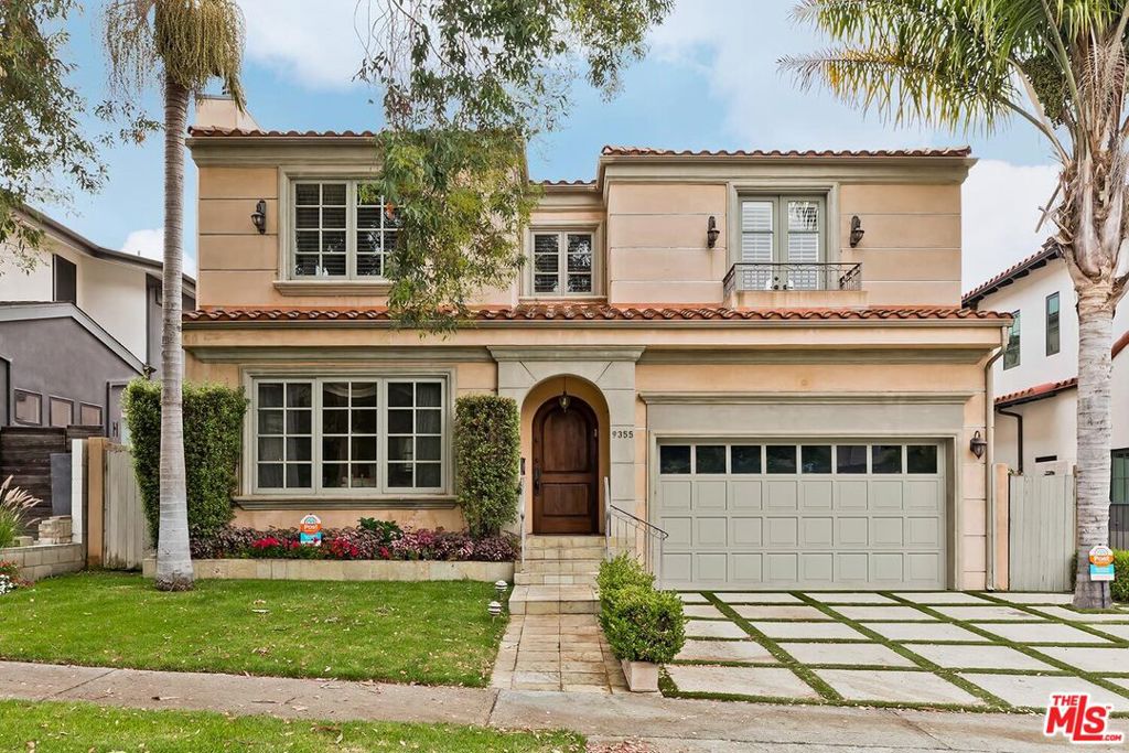 Located on a picturesque tree-lined street in Prime Beverlywood HOA, this stunning home offers high-end finishes throughout, including Jerusalem stone, distressed walnut floors, and whole-house surround sound. The grand entryway leads to formal living and dining rooms, a dramatic curved staircase, and a chef's kitchen featuring Sub-Zero/Wolf appliances, double sinks/dishwashers, and an oversized island. Enjoy seamless indoor-outdoor living with a spacious den opening to a lush backyard with built-in grill. One en-suite bedroom is located on the main level, ideal for guests or staff. Upstairs, the expansive primary suite boasts a private balcony with city views, custom walk-in closet, and a spa-like bath with steam shower and soaking tub. Three additional bedrooms, including one en-suite, plus a large shared bath and upstairs laundry complete the layout. Moments from Circle Park, Pico Blvd, and major freeways, this home offers both luxury and convenience.
