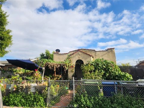 Photo of 806 E 105th Street, Los Angeles, CA 90002 (MLS # SB26107425)