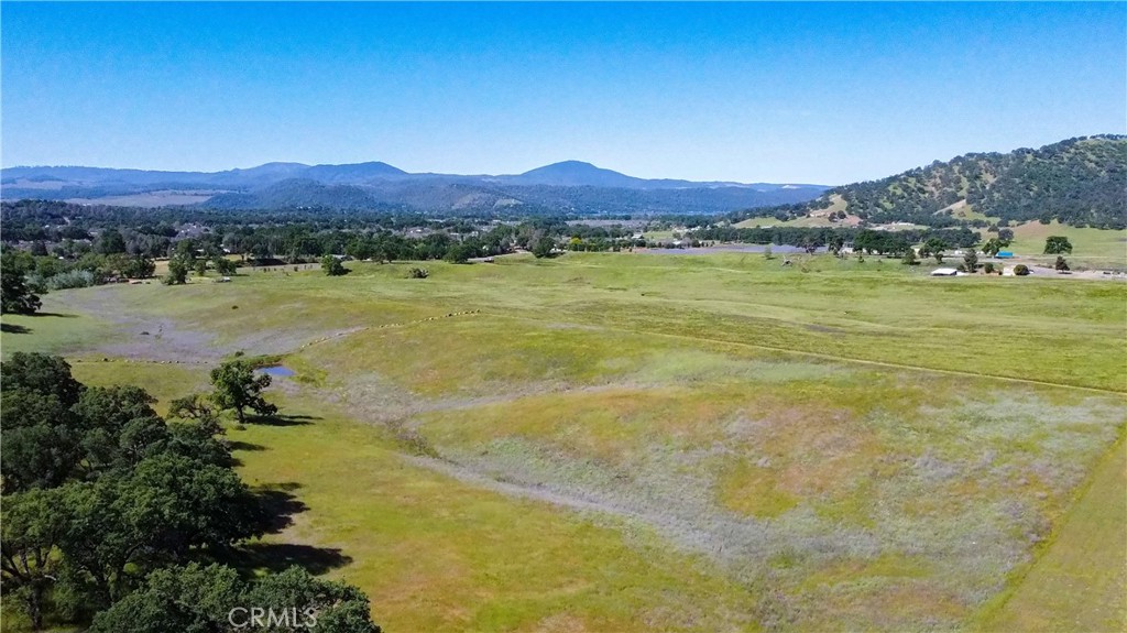 County records show this parcel at just over 10 acre and zoned Rural Residential. Conveniently located just off of Hwy 53; acreage sits at the north end of the Burns Valley area. Great views of hills and mountains to the south. Open land to plat that vineyard plus some shady areas with old growth Oaks. Easy access off Hwy 53 to Park Place.