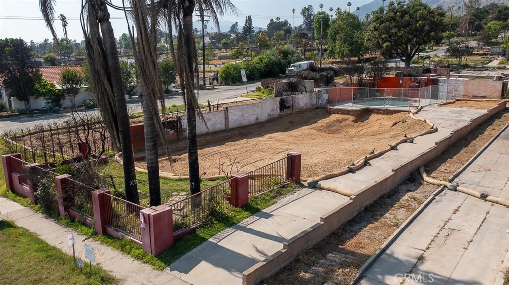 Great price. A fantastic opportunity to build your new home on a flat lot with a pool situated in the desirable Altadena Country Club neighborhood East of Lake Avenue. Phase 1 and Phase 2 debris removal have been completed. A great quiet walkable neighborhood. Previous home was 4 bedrooms/2 bathrooms and nearly 1900 square feet all on one level. County/Altadena standards allow to built a NEW structure up to 2,650.5 square feet for the main structure not including a garage or an ADU (up to 1200 square feet). Take advantage of the County streamline process to obtain permits. County one-stop Center for all development is now located conveniently in Altadena and assures all property owners a quick turn around to help facilitate the buiding permits.