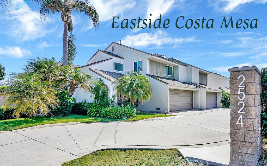 ABOUT THIS HOME: Discover your new beginnings within the coveted "City of the Arts" in one of the most sought-after neighborhoods, welcomes you to 2524 Elden Avenue in Eastside Costa Mesa! • An exceptional move-in-ready residence with a vibrant coastal luxury appeal, comprised of dual primaries bedrooms with their very own spa-inspired bathroom en-suite. • Nestled in a private community of only thirteen townhome design residences with excellent home appeal, curated by tropical palms and foliage surrounds you, setting the stage for the wonderful experiences that awaits inside! • Entryway flooded with natural light, courtesy of the entry door sidelight and by the elongated stairway clerestory window. • A timeless floorplan highlighted with appointed luxury elements throughout featuring a dedicated foyer, a pass-through to the second floor, a remodeled guest/powder bathroom and coat-closet for convenience. • Cherish everyday moments in the inviting Great Room with voluminous ceiling in the spacious family living w/intimate fireplace and access point to the outdoor main patio. • A culinary gourmet kitchen comes fully equipped with full stainless appliances, solid surface counters contrasted by high polished mosaic full backsplash, and a pantry for additional kitchen ware storage or goods. • Kitchen seamlessly opens to a large dedicated dining area with a secondary side patio access to your side yard. • Upstairs would be the aforementioned dual primaries! • Both bedrooms are generous in size, large windows with plantation shutters, extensive wood work throughout, and each bathroom en-suite were highly upgraded with no expenses were spared. • A finished two vehicle direct access garage with built-in storage, epoxy coated flooring makes this home complete! • The value merits of this home opportunity are incredible in a desirable heart of Eastside Costa Mesa with year-round perfect coastal weather, and you deserve the very best! • Schedule your private home tour today and get a closer look while this home is still available.