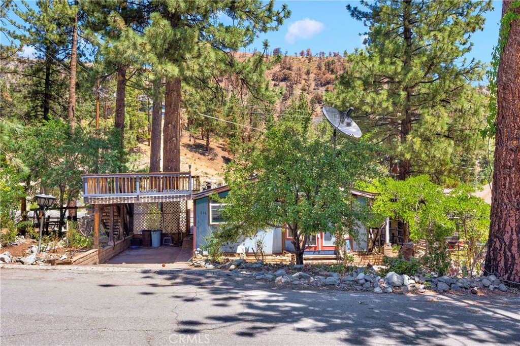 Incredible potential in the heart of this charming mountain town. Nestled in a serene setting with picturesque views of the surrounding mountains, this property is perfect for investors, flippers, or anyone looking to create their own mountain retreat. This home is being sold as-is and does require repairs, making it an ideal project for those with vision. Whether you're looking to renovate and resell or craft your dream home, the location and views provide a strong foundation for future value. Don’t miss your chance to own a piece of Wrightwood with stunning mountain scenery and endless potential.