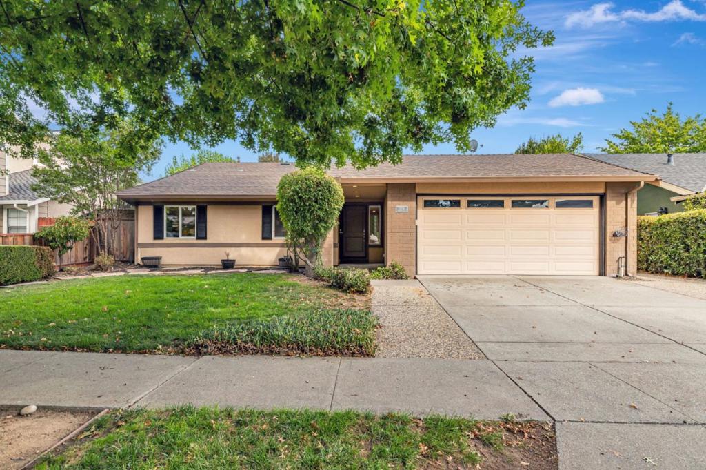 Welcome to this beautifully expanded and meticulously remodeled single-story home, located in the heart of Gilroy. This spacious residence features 4 generously sized bedrooms AND a dedicated home office, offering ample room for both relaxation and productivity. The home has been upgraded with fresh interior paint and elegant engineered hardwood flooring, as well as new carpet and padding in the bedrooms for added comfort. Remodeled bathrooms, featuring stylish new tile flooring and modern fixtures that create a spa-like atmosphere. The kitchen is a chef's dream, with brand-new dishwasher and range. The large living room boasts vaulted ceilings, creating a bright and airy space perfect for entertaining. The formal dining room is enhanced by a coffered ceiling, adding a touch of sophistication. Retreat to the luxurious primary suite, complete with a lit recessed ceiling and a spacious walk-in closet featuring custom built-in organizers. The entire home is equipped with a whole-house filtration system, ensuring clean and pure water throughout. This home combines comfort, style, and modern updates, making it the perfect sanctuary for any family. Don't miss out on the opportunity to make this gorgeous property your own.