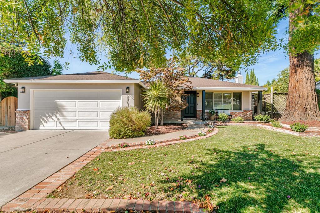 Welcome to this beautifully renovated home in San Jose's desirable Lynhaven neighborhood. Featuring 3 bedrooms and 2 bathrooms, this residence has been thoughtfully updated with fresh interior/exterior paint, resurfaced hardwood floors, and modern recessed lighting throughout. The stylish kitchen boasts new cabinets, countertops, custom backsplash, LVP flooring, a gas cooktop, and stainless-steel appliances perfect for everyday cooking and gathering. One bedroom includes a sunlit tiled nook with high ceilings, large windows, and direct access to a private patio, ideal as an office or quiet retreat. Additional upgrades include solar panels, newer AC, and copper plumbing for enhanced efficiency. Set on a spacious 8,250 sq ft lot with all-new landscaping, the backyard is ideal for entertaining, gardening, or play. Conveniently located near schools, shopping, dining, commuter routes, HWY 280/880/17, and major tech hubs, this home blends style, comfort, and modern living.