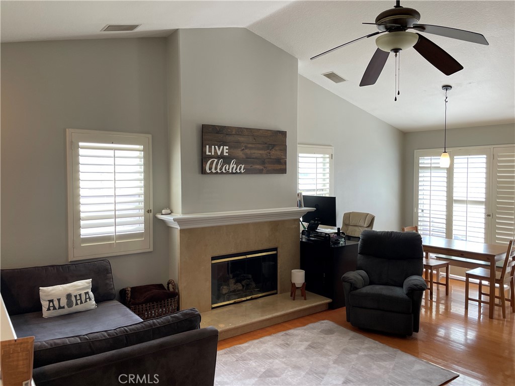Available October 2nd! Welcome to this two bedroom, two bathroom upper unit condo, with no attached walls and no one above or below. There is a main level entrance and once upstairs, all living areas and bedrooms are on one level. This home features abundant natural lighting, hard wood flooring and neutral carpeting in the bedrooms. The kitchen is light and bright and opens to the separate dining area and living room which features a fireplace. The primary suite is spacious with a large closet and en-suite bathroom. The second bedroom is across from the full second bathroom. Convenient garage access to the spacious two car garage, which houses the washer and dryer, and features plenty of built-in cabinets and storage space. The garage also has a large storage closet which can be utilized as a home office space. The condo is located in the popular Marina Hill's community, and is close to the beach and the shops and restaurants of Laguna Heights. This community offers walking trails with access to Salt Creek beach. Enjoy the community pool and spa steps away or use the Marina Hills resort style amenities with tennis, pool, clubhouse and community events.
