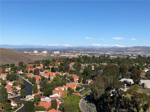Photo of 24055 Paseo Del Lago #1303, Laguna Woods, CA 92637 (MLS # OC26017659)