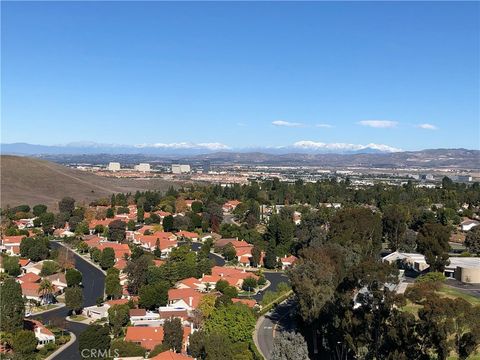 Photo of 24055 Paseo Del Lago #1303, Laguna Woods, CA 92637 (MLS # OC26017659)