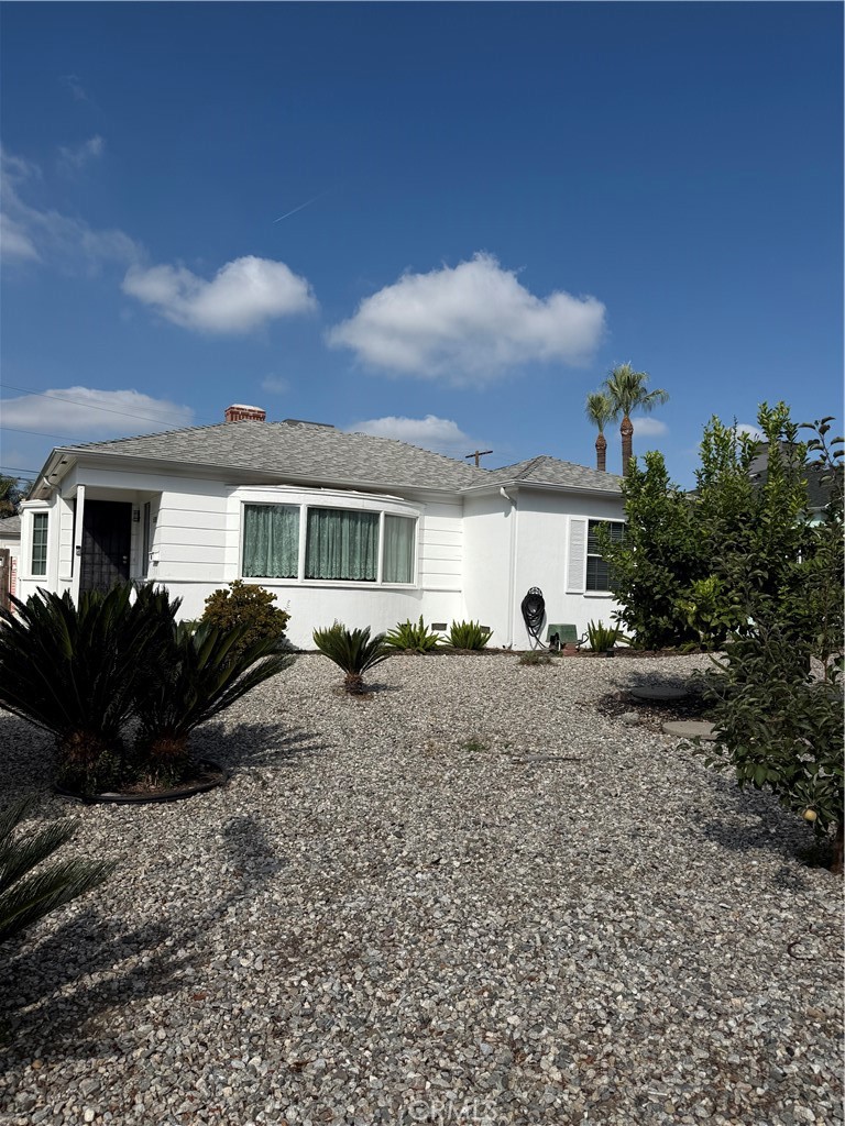Situated on a corner lot, Beautiful and spacious three-bedroom, two-bath home with a bonus room, ideally located in a quiet North Hollywood neighborhood. Features include hardwood floors throughout, an updated kitchen with granite countertops and newer appliances, a pool, and a two-car garage.