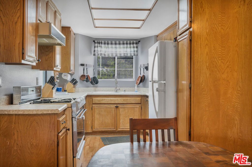 Photo of 10220 De Soto Avenue #24, Chatsworth, CA 91311 (MLS # 25612163)